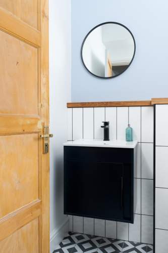 Black vanity with integrated sink