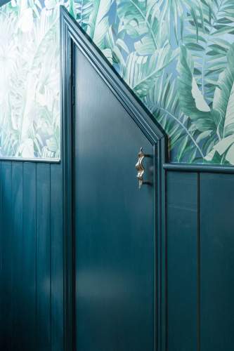 Solid wood paneling in this amazing WC cloakroom
