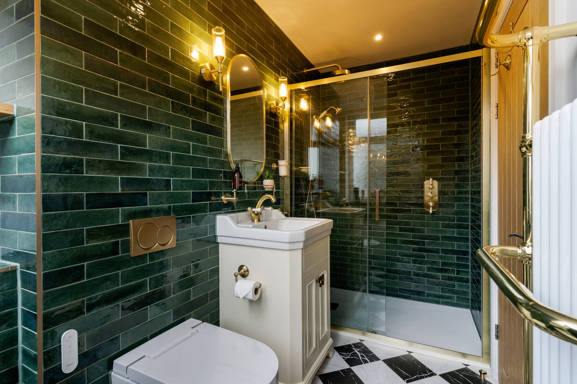 Traditional bathroom with bottle green tiles